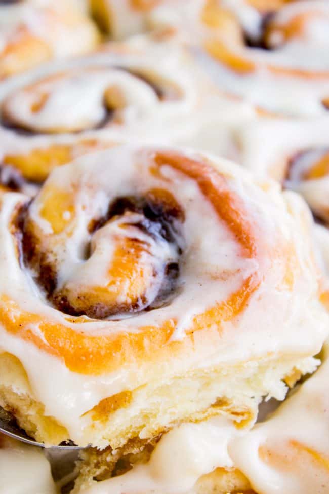 cinnamon rolls with icing shot from close up. 