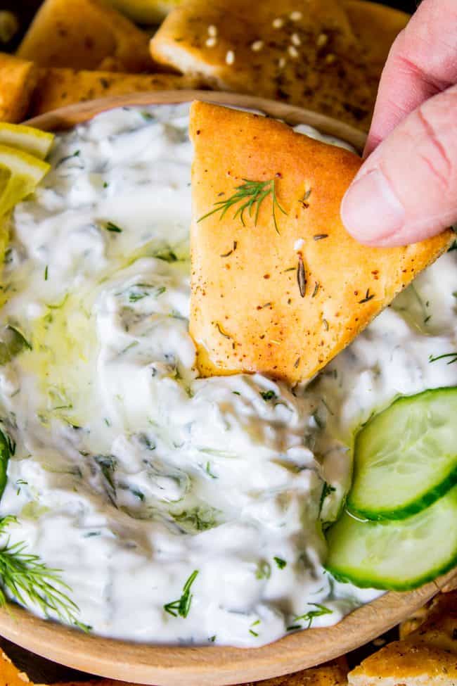 pita dipped in creamy cucumber sauce.