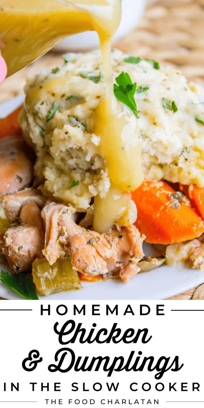 chicken and dumplings with carrots and gravy.
