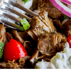 Greek gyro style Instant Pot shredded beef with fresh veggies.