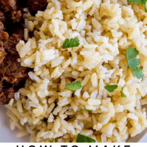 A close-up of a plate with fluffy brown rice garnished with parsley, next to a serving of cooked beef. Text at the bottom reads, Instant Pot Brown Rice. The Food Charlatan.