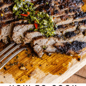 sliced flank steak with chimchurri sauce.