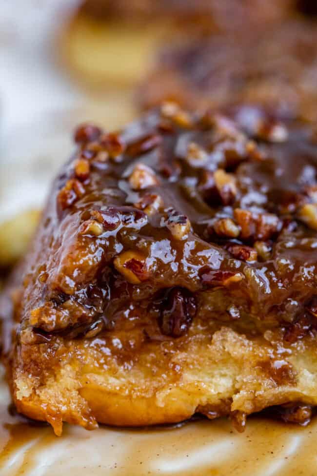 close up of caramel sticky bun with pecans