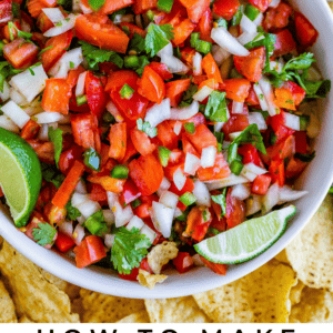 A bowl of fresh pico de gallo with diced tomatoes, onions, cilantro, and jalapeños, garnished with lime wedges, surrounded by tortilla chips and lime slices. Text reads: Classic Fresh Pico de Gallo.