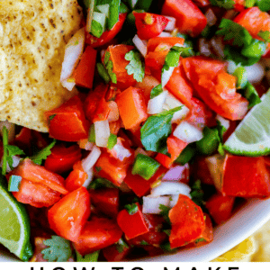 Close-up of a bowl of vibrant pico de gallo with chopped tomatoes, onions, cilantro, and lime wedges, alongside tortilla chips. Text reads: Authentic pico de gallo. The Food Charlatan.