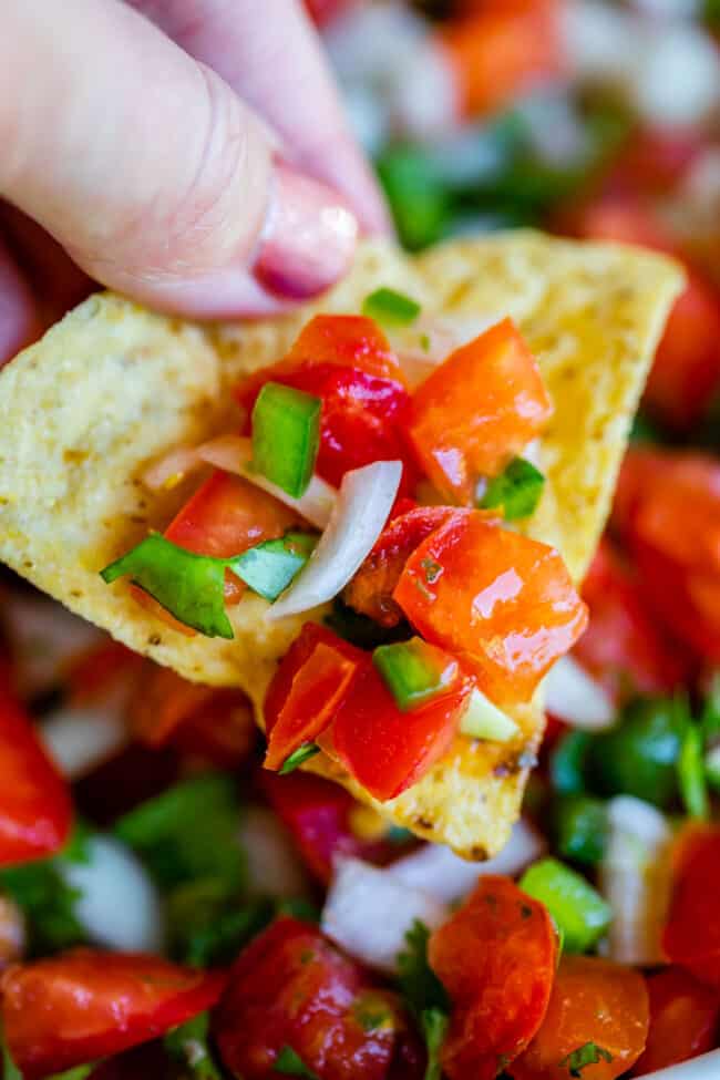 pico de gallo on a tortilla chip.