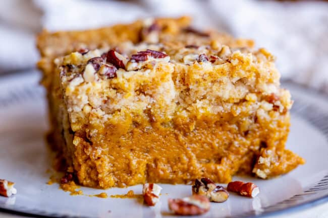 Single slice of pumpkin dump cake recipe on a white plate