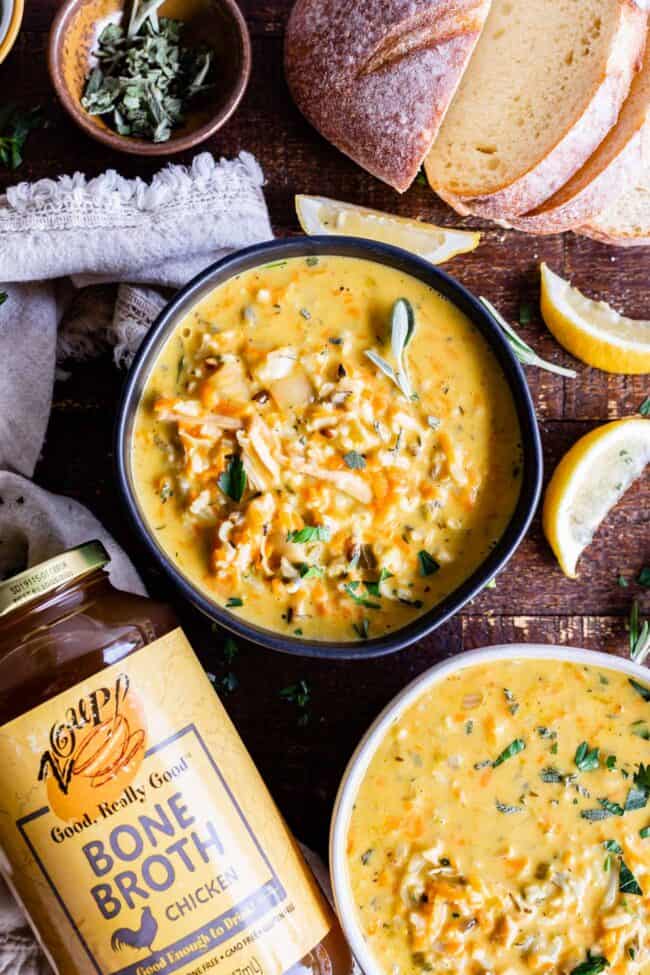 creamy turkey soup in a bowl next to sliced bread and napkin