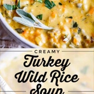 Close-up of creamy turkey rice soup with carrots and herbs in a bowl, a spoon scooping some out. Text overlay reads “Creamy Turkey Wild Rice Soup Crockpot/Stovetop.”.