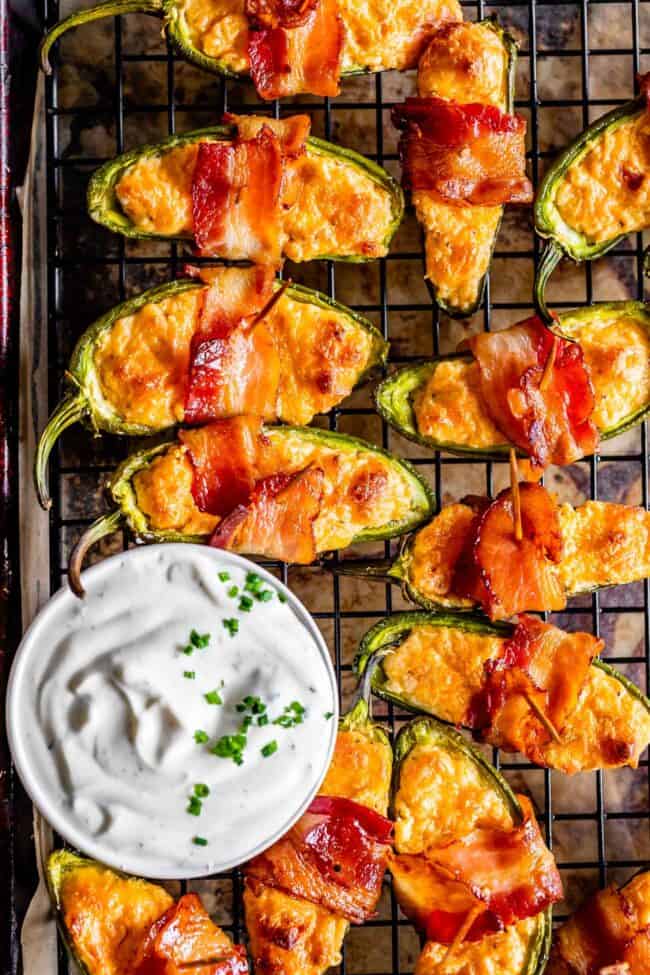 bacon wrapped jalapeno poppers with ranch dip.