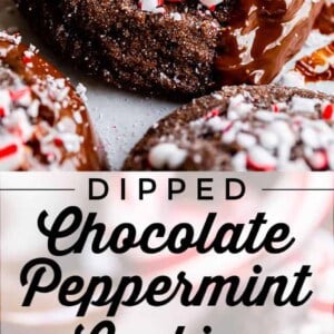 Close-up of chocolate peppermint cookies dipped in melted chocolate and topped with crushed peppermint candies. A text overlay reads Dipped Chocolate Peppermint Cookies, with some cookies shown with a bite taken out.