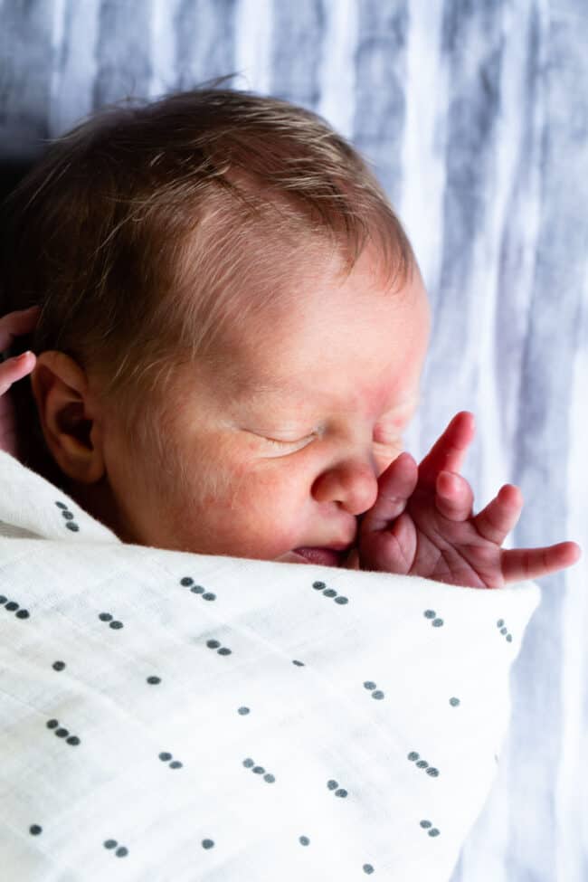 Head of swaddled baby