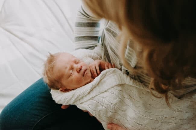 Young baby with mother