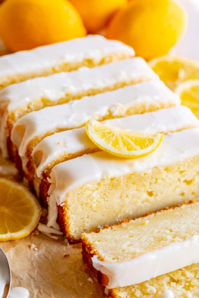 a loaf of sliced lemon bread with glaze.