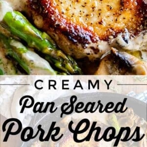 Pan-seared pork chops in sauce, topped with mushrooms and asparagus, served in a black skillet on a wooden table. Text overlay reads, Creamy Pan Seared Pork Chops with Asparagus.