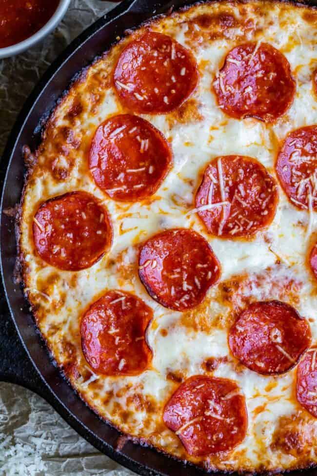 cast iron pan pizza with pepperoni.