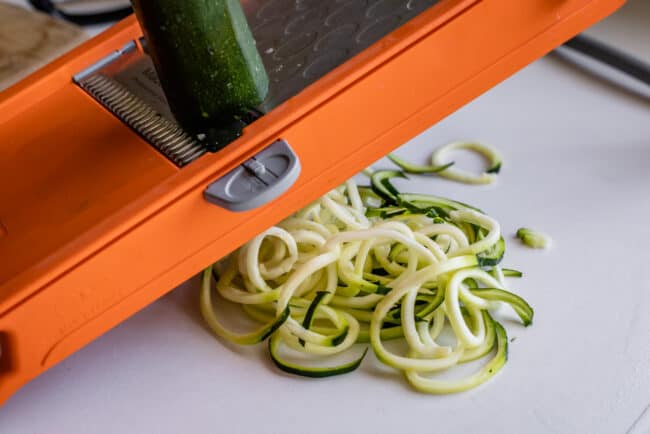 using a mandoline to make zucchini noodles