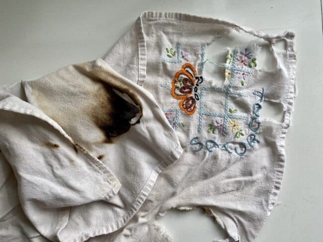 Burnt embroidered dishcloth.