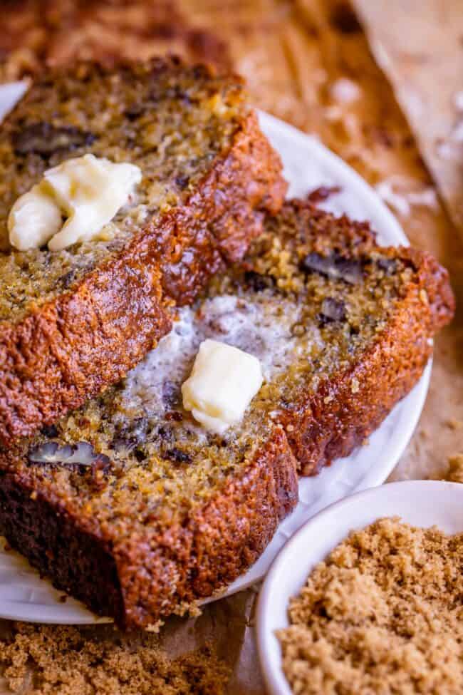 melting butter on slices of banana nut bread.