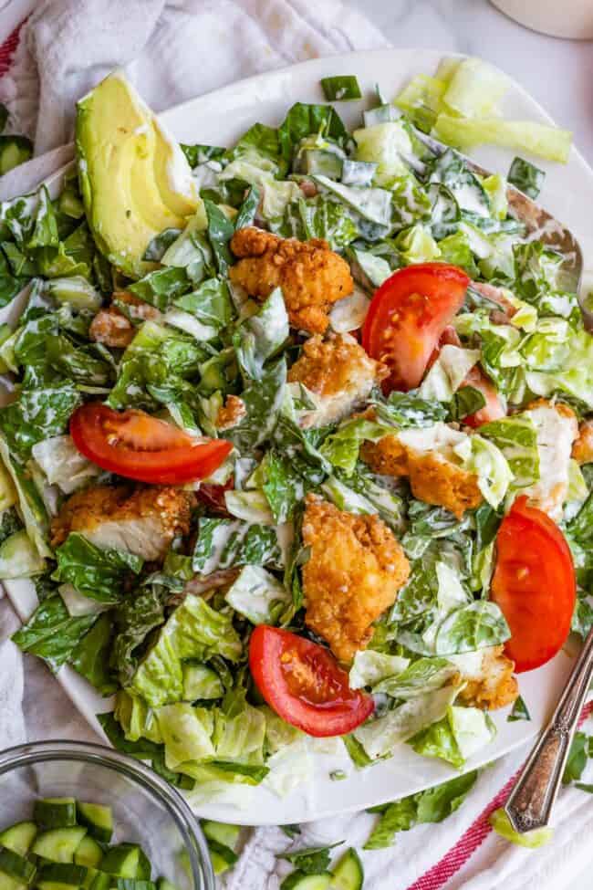 crispy chicken salad on a plate mixed with ranch dressing