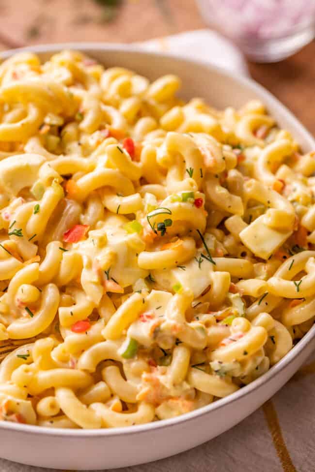 macaroni salad with chopped hard boiled eggs in a bowl. 