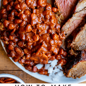 a plate with Santa Maria pinquito beans, tri tip, and chopped onions.