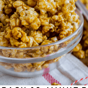 Close-up of glass bowls filled with Caramel Popcorn, set on a red-striped cloth. The text below reads: Easy 10-minute Microwave Caramel Popcorn. The Food Charlatan.