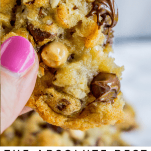 hand holding a Texas cowboy cookie.