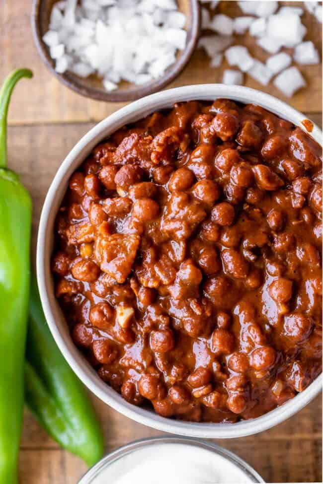 pinquito beans with anaheim peppers and chopped onions.