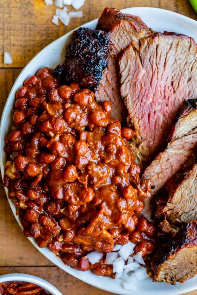 santa maria beans on a plate with tri tip.