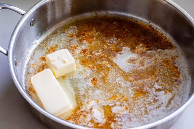 melting butter in a pan.