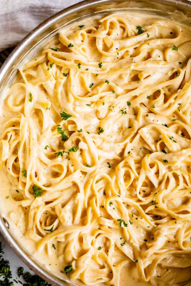 creamy fettuccine Alfredo in a pan from overhead.