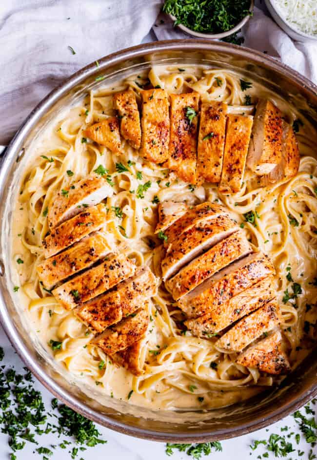 overhead picture of chicken alfredo in a pan.