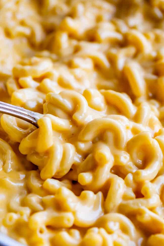 quick and easy mac and cheese in a pan with a spoon