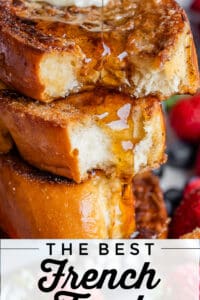 a stack of thick challah french toast with butter and syrup