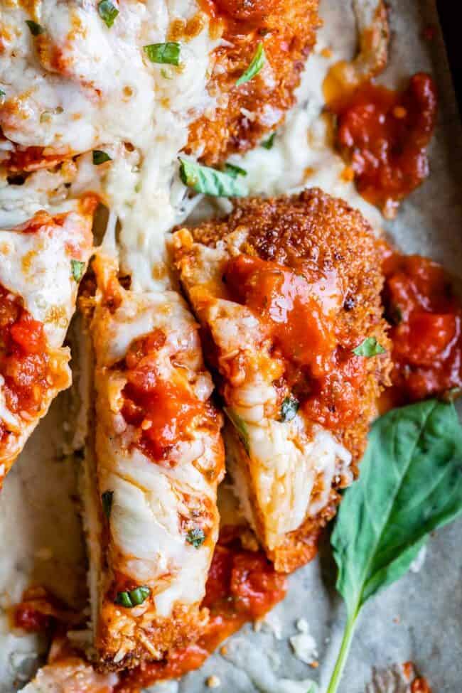 best chicken parmesan recipe sliced on a pan and shot from overhead