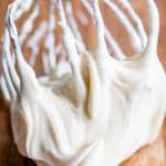 easy cream cheese frosting on a beater on a table