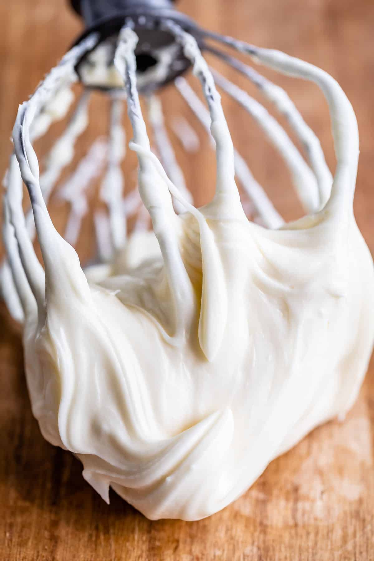 easy cream cheese frosting on a beater on a table