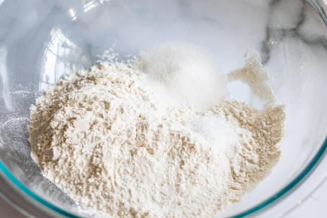 flour, salt, and sugar in a bowl for pie crust