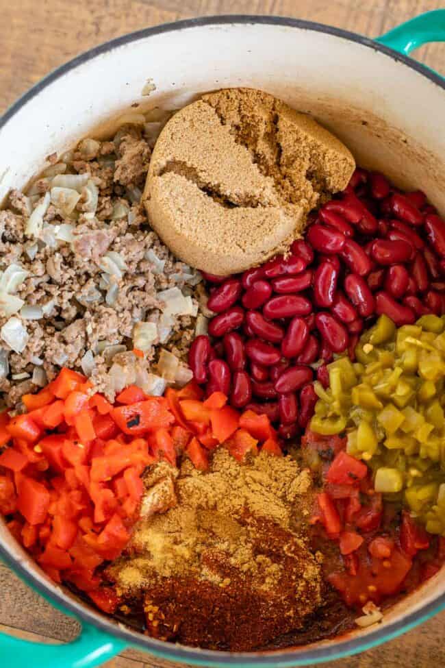 ingredients for chili arranged in a pot 