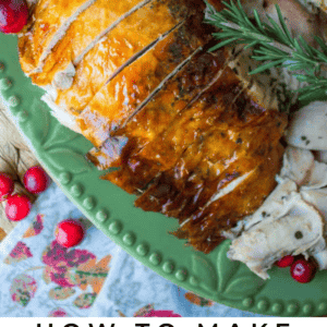 sliced roast turkey with fresh cranberries.