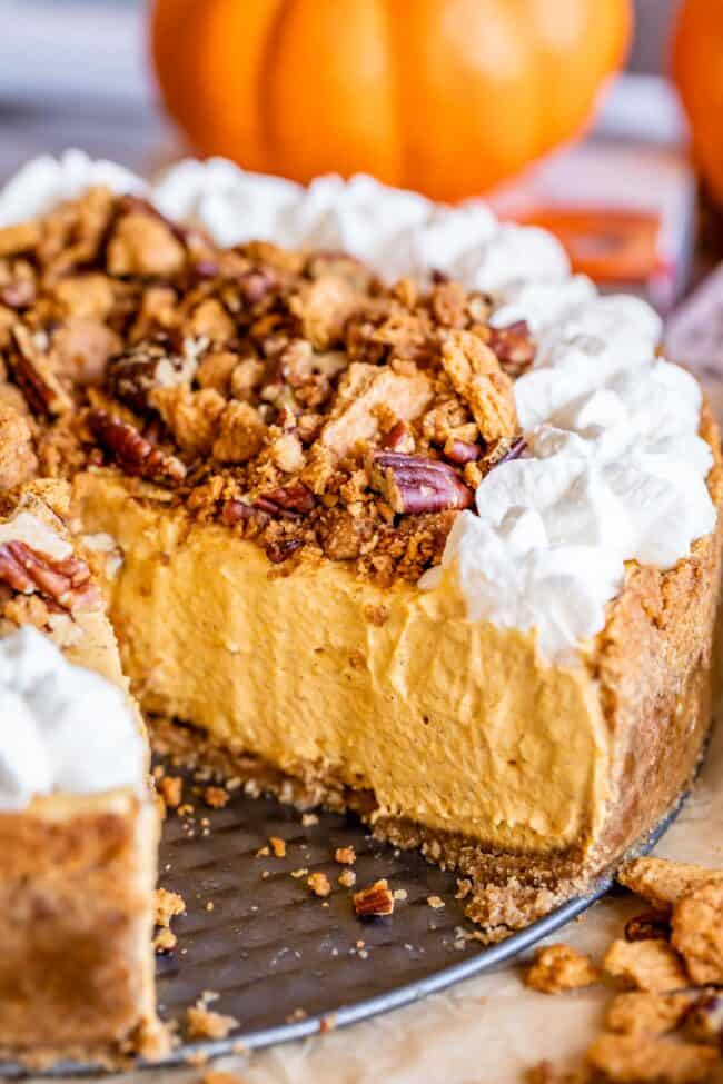 no bake pumpkin cheesecake with pecans and graham crackers and whipped cream.