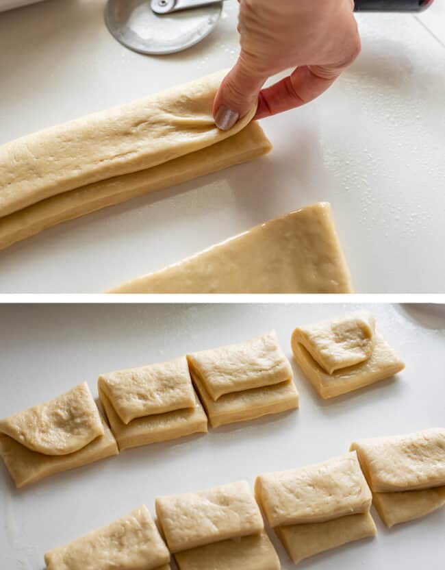 shaping raw bread dough to go into the oven.