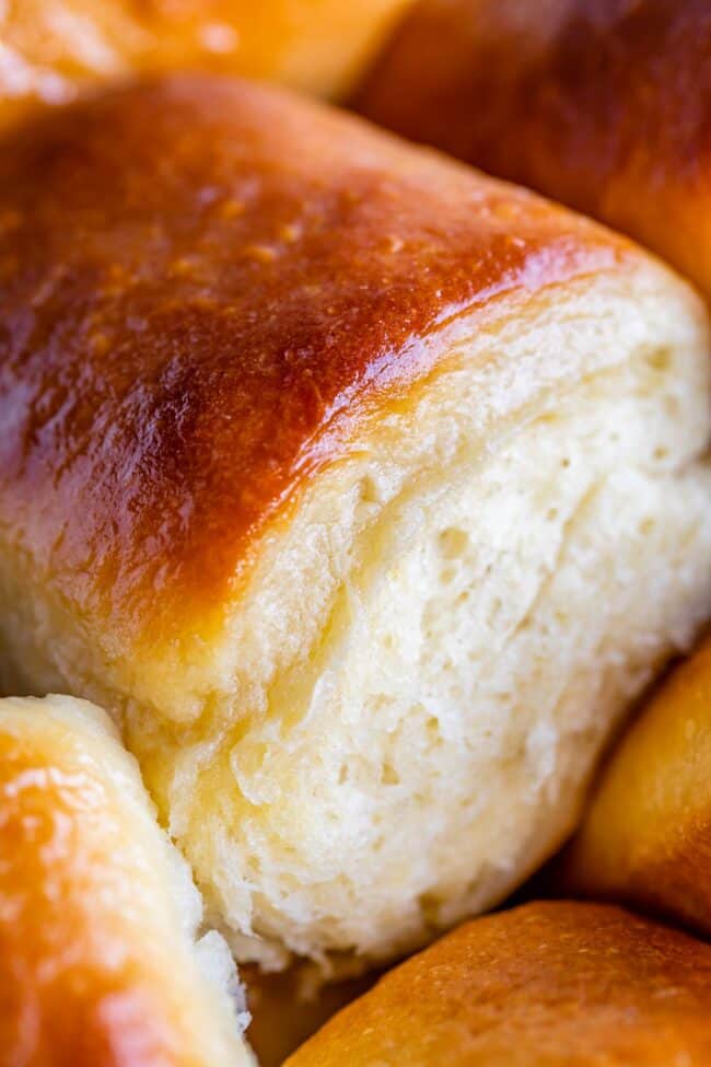 Soft parker house roll with buttery top.