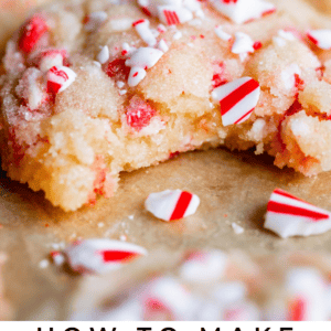 peppermint crunch sugar cookies, one with a bite taken out.