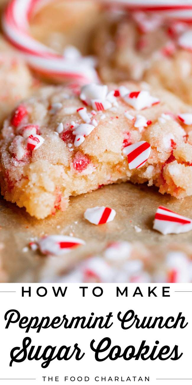 peppermint crunch sugar cookies, one with a bite taken out.