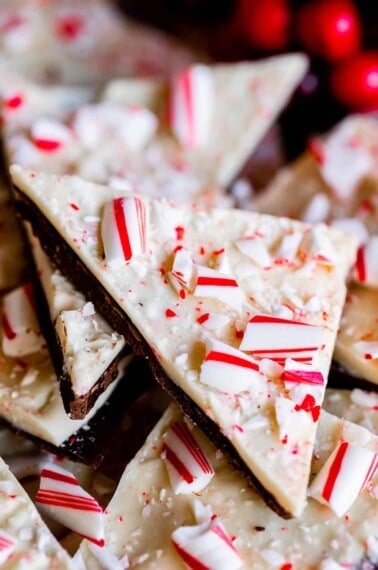 a triangle of peppermint bark with candy canes