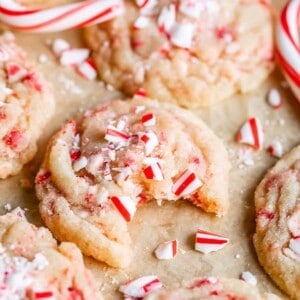 peppermint sugar cookies with crushed candy canes and whole candy canes