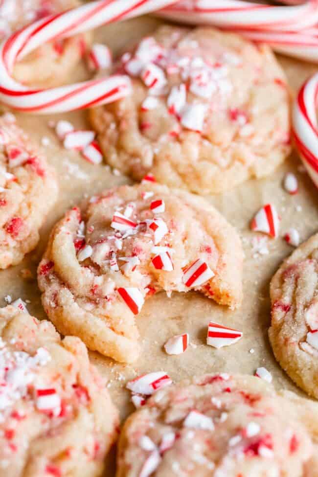 peppermint sugar cookies with crushed candy canes and whole candy canes