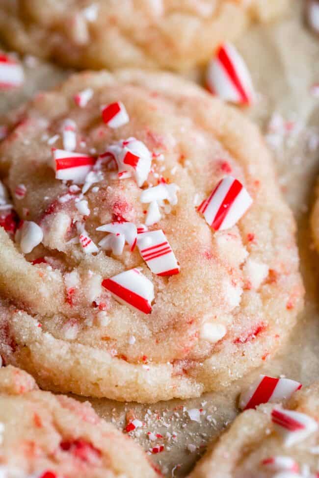 peppermint sugar cookies on a pan with crush candy canes on top